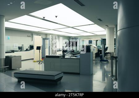 Security gates with metal detectors and scanners at entrance of airport Stock Photo