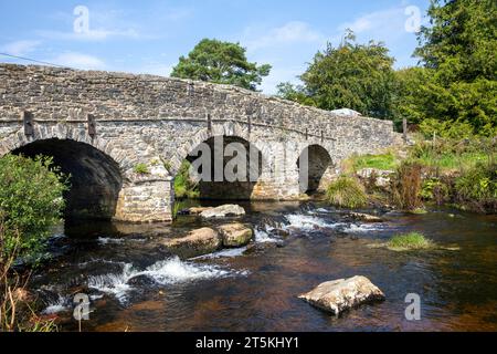 Postbridge hamlet in Dartmoor national park, road bridge over the east dart river, adjacent to the clapper bridge,Devon,England,UK,2023 Stock Photo