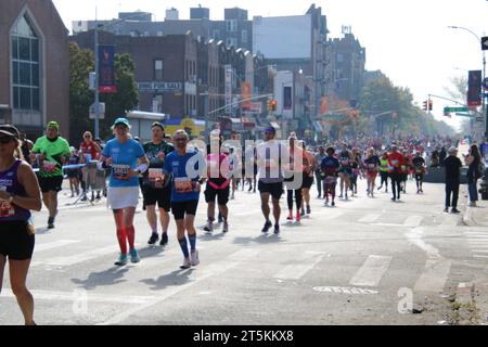 4th Ave and Senator St in Bayridge, Brooklyn, NY 11220 USA. Nov 5, 2023. Under cool, partially-cloudy skies, over 50,000 Runners tackled the 26 mile 2023 New York Marathon across five boroughs, pursuing a generally relaxed and partiful race on a mild autumn day. Credit: ©Julia Mineeva/EGBN TV News/Alamy Live News Stock Photo