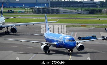 Schiphol, The Netherlands - August 14 2023 An Airbus A320-200 from ITA Airways with tail number EI-DSW is arriving Stock Photo