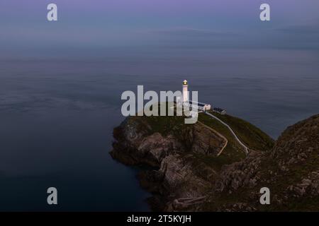 The iconic South Stack Lighthouse on the coast of Anglesey, Wales. Stock Photo