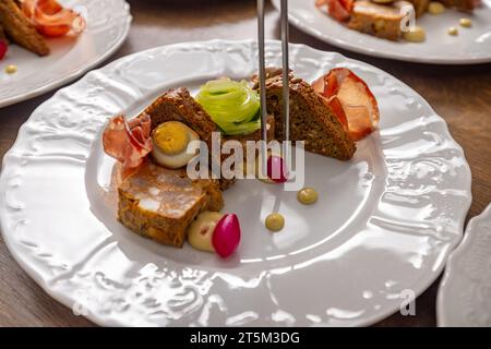 Scene encapsulates the art of culinary presentation in a professional kitchen setting. Stock Photo