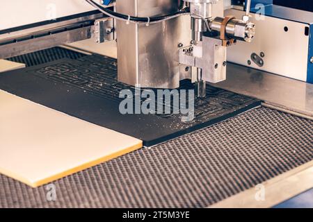 Close up high pressure water jet CNC cutting in factory workshop Stock Photo