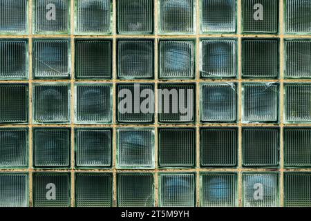 Old solid glass block brick wall pattern as background Stock Photo