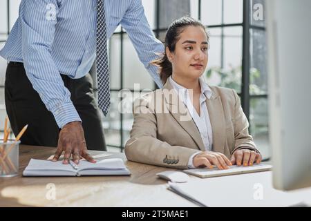 Group of business people and software developers working as a team in office Stock Photo