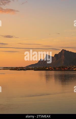 Evening view over northern Lofoten, Norway. Mountains, sea, reflections, cloudscape. Spectacular scenery. Stock Photo