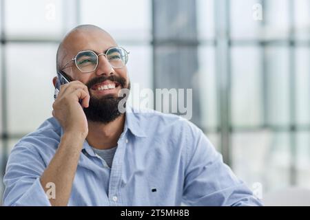 Businessman working on the table with laptop in a new office Stock Photo