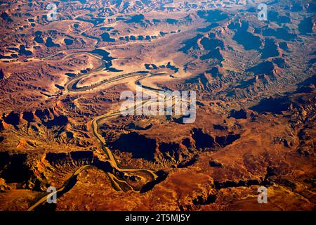 Aerial view of a winding river cutting through a mountainous region of Arizona. Stock Photo