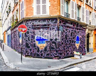 Street art mural by Kay One (therealkayone) on empty shop in Butte-Montmartre, Paris 18, France. Stock Photo