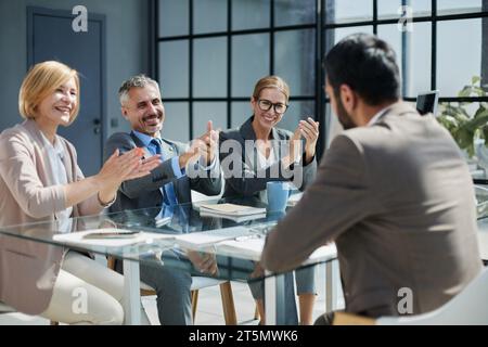 Multicultural professionals project managers group negotiating in boardroom at meeting. Stock Photo