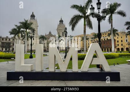 Lima city sign at main square in front of the city hall facade. The ...