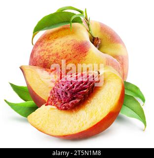 Ripe peach fruit with leaves and peach half isolated on white background. Stock Photo