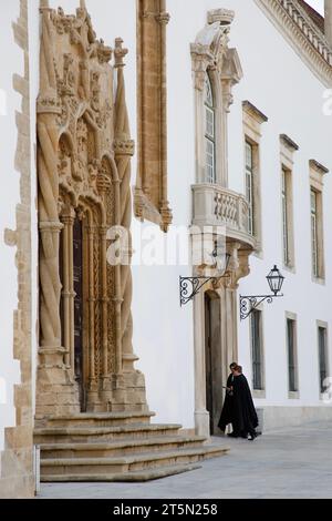 COIMBRA, PORTUGAL - November 12, 2021: View on the courtyard of the oldest university with students in black uniform in Coimbra city in the central Po Stock Photo