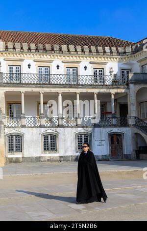 COIMBRA, PORTUGAL - November 12, 2021: View on the courtyard of the oldest university with students in black uniform in Coimbra city in the central Po Stock Photo