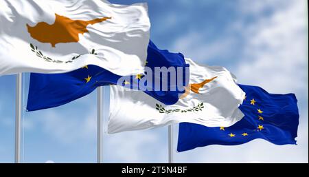 Cyprus national flag waving in the wind with the European Union flag on a clear day. 3d illustration render. Fluttering fabric. Selective focus Stock Photo