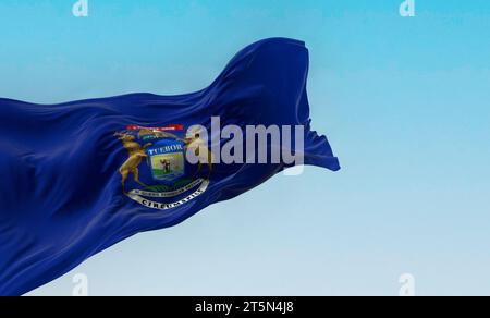 Michigan state flag waving in the wind on a clear day. Dark blue flag with state coat of arms featuring an eagle, an elk and a moose. 3d illustration Stock Photo