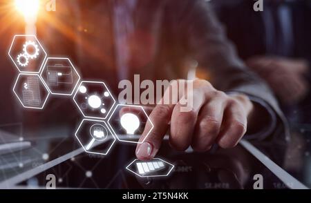 businessman pressing his finger on the screen of the digital tab Stock Photo