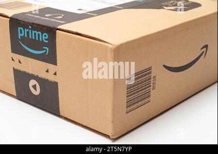 Fuji, Shizuoka, Japan - August 11, 2022: Cardboard box with Amazon Prime logo isolated on white background in closeup. Stock Photo