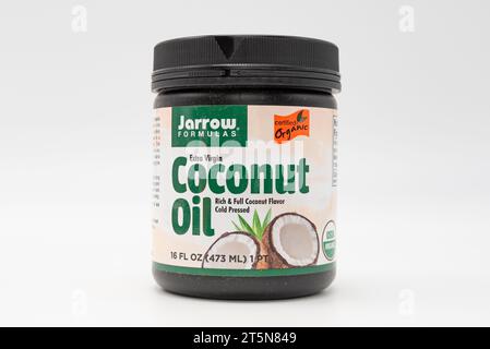 Fuji, Shizuoka, Japan - March 21, 2023: Extra Virgin Coconut Oil 16 fl oz (473 g) by Jarrow Formulas. Isolated on White Background with copy space. Stock Photo