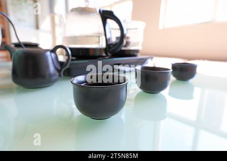 Chinese tea sets are on the tea table Stock Photo