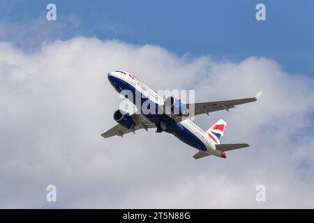 British Airways Airbus A320-251N Neo, registration G-TTNM taking off from London Heathrow LHR in perfect conditions on a sunny summer afternoon Stock Photo