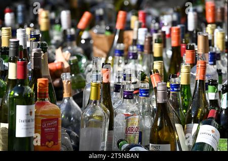 A large number of discarded bottles, indicating that a good time was had by many people the night before Stock Photo