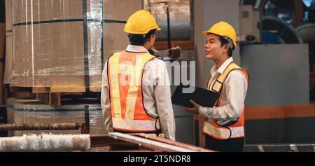 Asian engineer team conduct inspection on industrial steel or metal for highest quality of roll steel material for heavy construction engineering Stock Photo