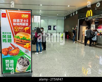 Beijing, China, Small Crowd People, inside views of Beijing Daxing International Airport, Mcdonalds Fast Food Restaurant, Sign Front, china capitalism, restaurant airport friends Stock Photo