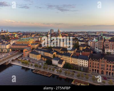 Stockholm city skyline at dusk, view over Södermalm and towards Globen. Drone view, late september. Stock Photo