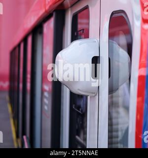 CCTV camera outside the transport for the safety of the entrance and exit of passengers from the doors of the train car Stock Photo