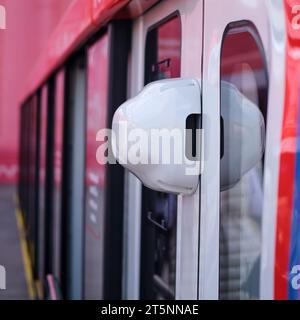 CCTV camera outside the transport for the safety of the entrance and exit of passengers from the doors of the train car Stock Photo