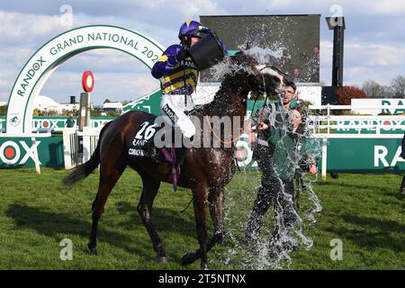 Grand National 2023 Jockey Derek Fox cooling off Coach Rambler after Grand National victory Stock Photo