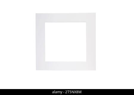 White square paper frame isolated on white background. Minimalist style home decor. Cardboard picture edging Stock Photo