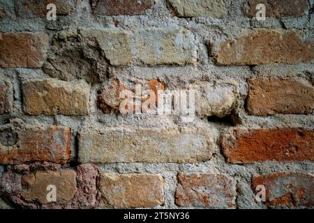 Urban background, white ruined industrial brick wall with copy space Stock Photo