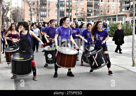 Igualada, Barcelona; March 8, 2020: celebration of Women's Day with the batucada group Protons Percussion, playing through the streets of Igualada Stock Photo