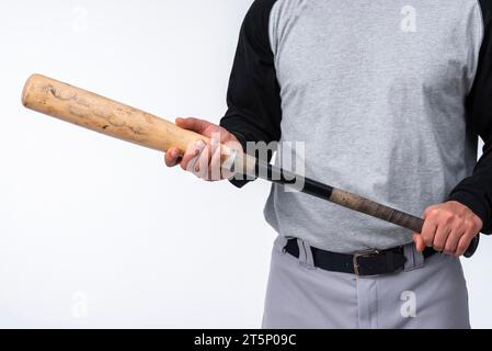 Close up baseball player holding bat Stock Photo