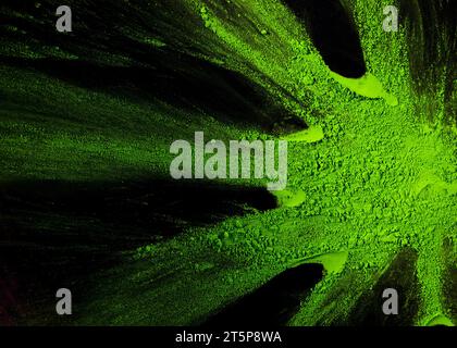 Hand drawn design made with green powder color black background Stock Photo