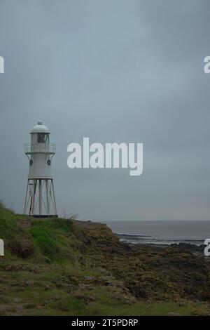 Black Nore Lighthouse in Portishead. Photo taken in October 2023 during a rainy and misty day. This lighthouse is located close to the city of Bristol Stock Photo