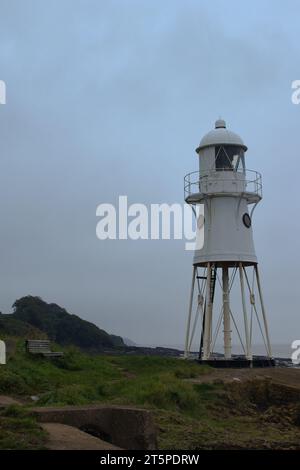 Black Nore Lighthouse in Portishead. Photo taken in October 2023 during a rainy and misty day. This lighthouse is located close to the city of Bristol Stock Photo