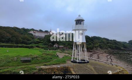 Black Nore Lighthouse and the ex-National Nautical School in Portishead. Photo taken on the DJI Mini 3 in October 2023. Stock Photo