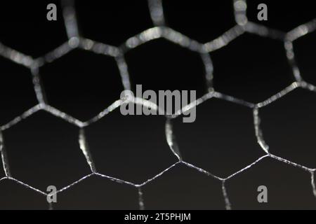 Honeycomb metal pattern. Black texture. Stock Photo