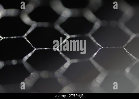 Honeycomb metal pattern. Black texture. Stock Photo