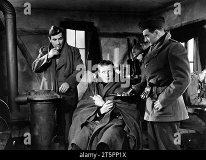 Gary Merrill, Richard Basehart, Harold Benedict, on-set of the film, 'Decision before Dawn', 20th Century-Fox, 1951 Stock Photo