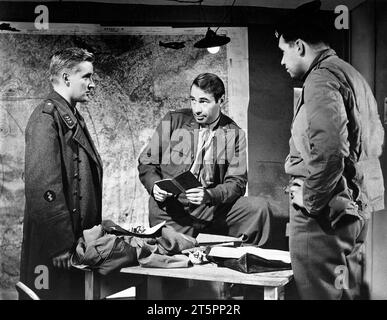 Oskar Werner (left), Gary Merrill (center), on-set of the film, 'Decision before Dawn', 20th Century-Fox, 1951 Stock Photo