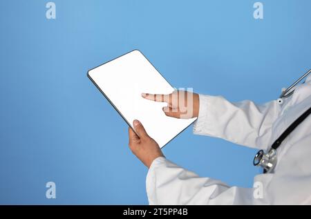 Telemedicine Concept. Doctor Woman Using Digital Tablet With Blank White Screen Stock Photo