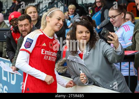 London, UK. 05th Nov, 2023. London, England, November 5th 2023: Amanda Ilestedt (28 Arsenal) takes a picture with a fan during the FA Women's Super League match between Arsenal and Manchester City at Meadow Park in London, England (Alexander Canillas/SPP) Credit: SPP Sport Press Photo. /Alamy Live News Stock Photo