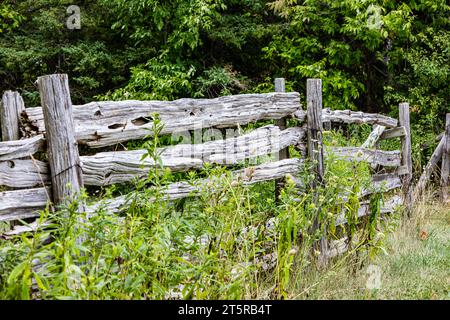 old wooden farm fence in the countryside Stock Photo