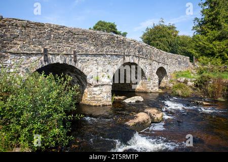 Postbridge hamlet in Dartmoor national park, road bridge over the east dart river, adjacent to the clapper bridge,Devon,England,UK,2023 Stock Photo