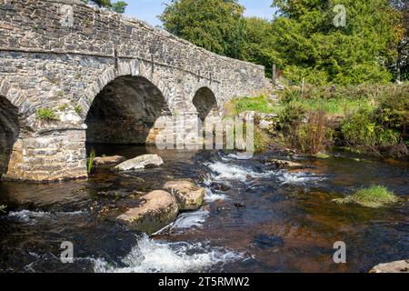 Postbridge hamlet in Dartmoor national park, road bridge over the east dart river, adjacent to the clapper bridge,Devon,England,UK,2023 Stock Photo