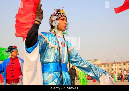 LUANNAN COUNTY - MARCH 6: traditional Chinese style yangko dance performances in the square, on march 6, 2015, Luannan County, Hebei province, China Stock Photo